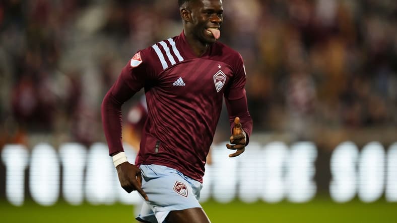 Oct 23, 2021; Commerce City, Colorado, USA; Colorado Rapids forward Dominique Badji (8) celebrates his goal in the first half against the Portland Timbers at Dick's Sporting Goods Park. Mandatory Credit: Ron Chenoy-USA TODAY Sports