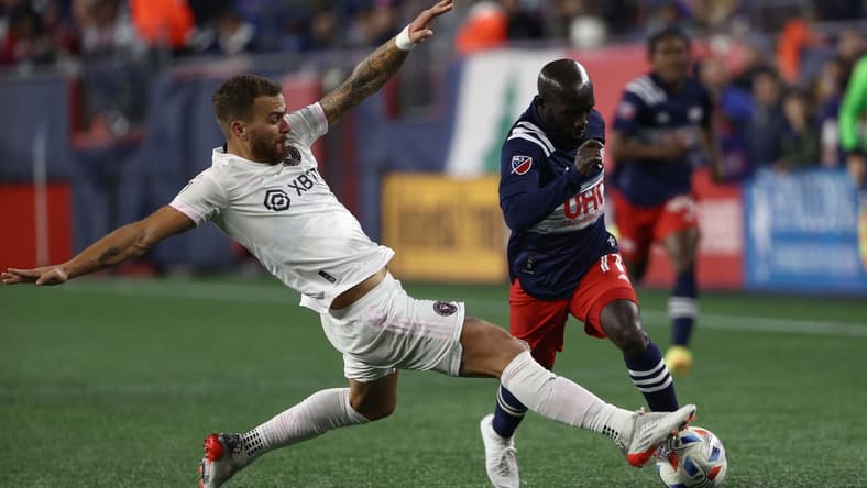 Nov 7, 2021; Foxborough, Massachusetts, USA; Inter Miami defender Leandro Gonzalez (6) stops New England Revolution midfielder Ema Boateng (11) during the second half at Gillette Stadium. Mandatory Credit: Winslow Townson-USA TODAY Sports