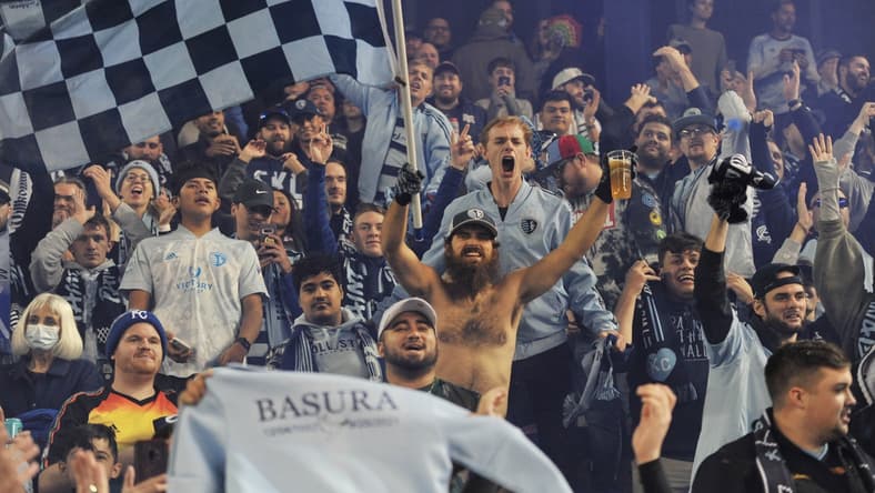 Nov 20, 2021; Kansas City, KS, USA; Sporting Kansas City fans cheer after the team beat the Vancouver Whitecaps in a round one MLS Playoff game at Children's Mercy Park. Mandatory Credit: Amy Kontras-USA TODAY Sports