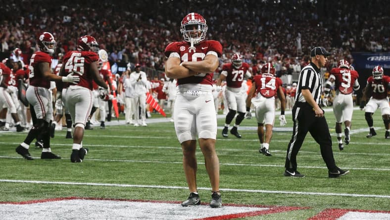 Dec 4, 2021; Atlanta, GA, USA; Alabama Crimson Tide linebacker Henry To'o To'o (10) celebrates after a stop against the Georgia Bulldogs on a fourth down with seconds left on the clock during the SEC championship game at Mercedes-Benz Stadium. Alabama won 41-24. Mandatory Credit: Gary Cosby Jr.-USA TODAY Sports