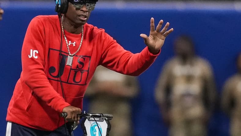 Dec 18, 2021; Atlanta, GA, USA; Jackson State Tigers head coach Deion Sanders reacts on the sidelines against the South Carolina State Bulldogs during the first half during the 2021 Celebration Bowl at Mercedes-Benz Stadium. Mandatory Credit: Dale Zanine-USA TODAY Sports