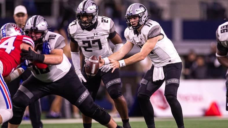 Guyer quarterback Jackson Arnold (11) snaps the ball against Westlake during the Class 6A Division 2 State Championship game at AT&T Stadium in Arlington, Texas on Dec. 18, 2021. Westlake defeated Guyer 40-21.
Aem Westlake Vs Guyer 11