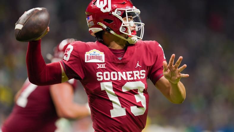Dec 29, 2021; San Antonio, Texas, USA; Oklahoma Sooners quarterback Caleb Williams (13) throws a pass during the first half of the 2021 Alamo Bowl against the Oregon Ducks at the Alamodome. Mandatory Credit: Daniel Dunn-USA TODAY Sports