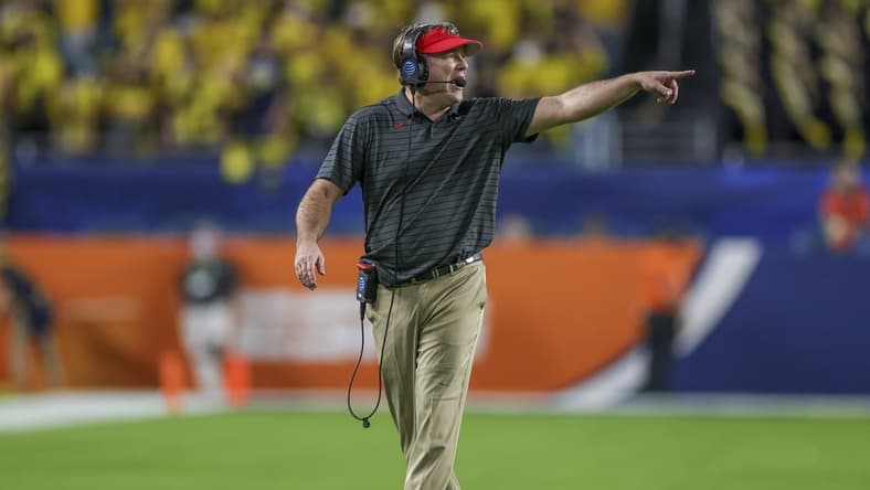 Dec 31, 2021; Miami Gardens, Florida, USA; Georgia Bulldogs head coach Kirby Smart gestures in the fourth quarter against the Michigan Wolverines during the Orange Bowl college football CFP national semifinal game at Hard Rock Stadium. Mandatory Credit: Sam Navarro-USA TODAY Sports