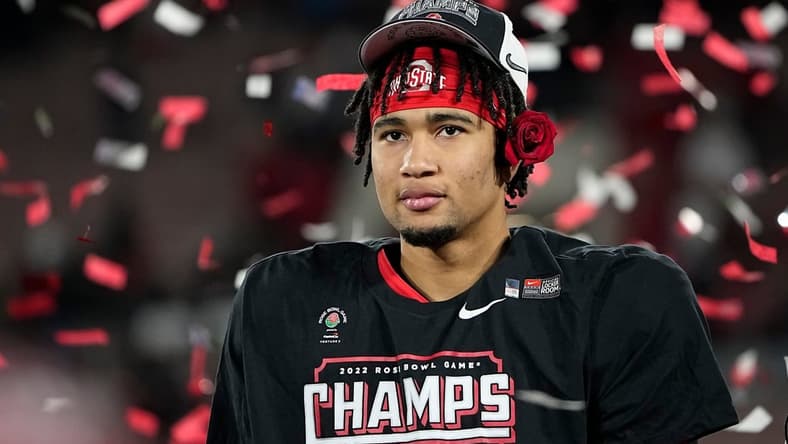 Ohio State Buckeyes quarterback C.J. Stroud (7) wears a rose behind his ear following the 48-45 win over the Utah Utes in the Rose Bowl in Pasadena, Calif. on Jan. 1, 2022.
College Football Rose Bowl