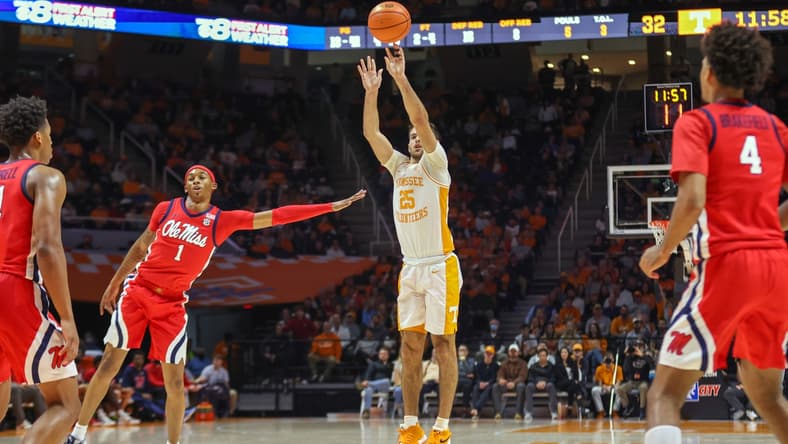 Jan 5, 2022; Knoxville, Tennessee, USA; Tennessee Volunteers guard Santiago Vescovi (25) shoots the ball against the Mississippi Rebels during overtime at Thompson-Boling Arena. Mandatory Credit: Randy Sartin-USA TODAY Sports