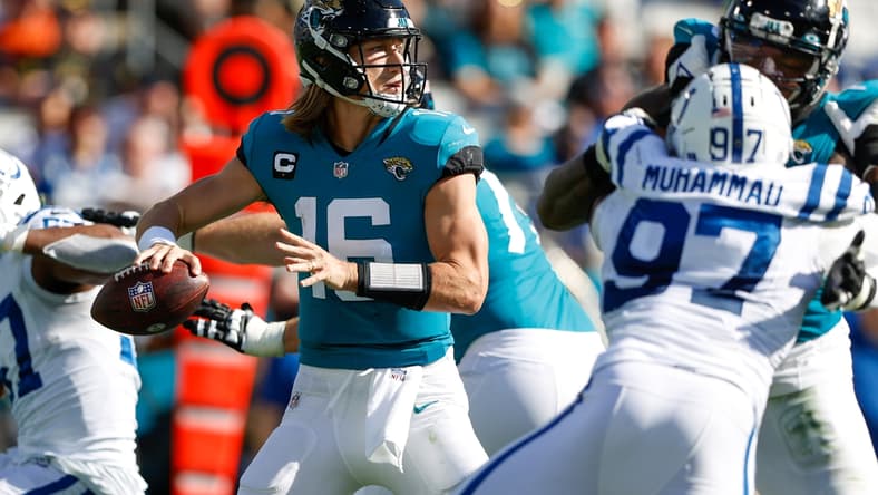 Jan 9, 2022; Jacksonville, Florida, USA;  Jacksonville Jaguars quarterback Trevor Lawrence (16) drops back to pass in the second quarter against the Indianapolis Colts at TIAA Bank Field. Mandatory Credit: Nathan Ray Seebeck-USA TODAY Sports