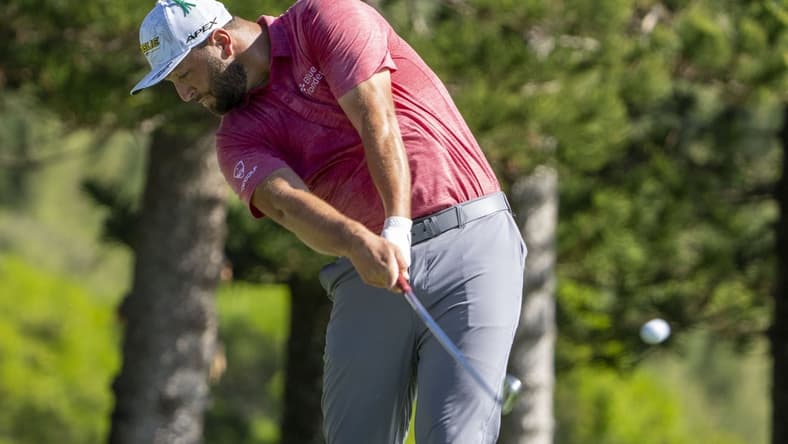 January 9, 2022; Maui, Hawaii, USA; Jon Rahm hits his tee shot on the second hole during the final round of the Sentry Tournament of Champions golf tournament at Kapalua Resort - The Plantation Course. Mandatory Credit: Kyle Terada-USA TODAY Sports