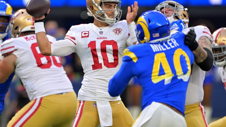 Jan 9, 2022; Inglewood, California, USA; San Francisco 49ers quarterback Jimmy Garoppolo (10) sets to pass the ball in the first half of the game against the Los Angeles Rams at SoFi Stadium. Mandatory Credit: Jayne Kamin-Oncea-USA TODAY Sports