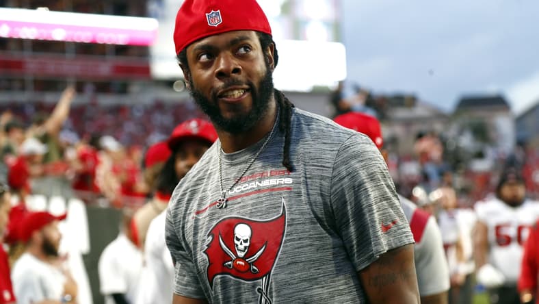 Jan 9, 2022; Tampa, Florida, USA;Tampa Bay Buccaneers cornerback Richard Sherman (5) looks on against the Carolina Panthers during the first half at Raymond James Stadium. Mandatory Credit: Kim Klement-USA TODAY Sports
