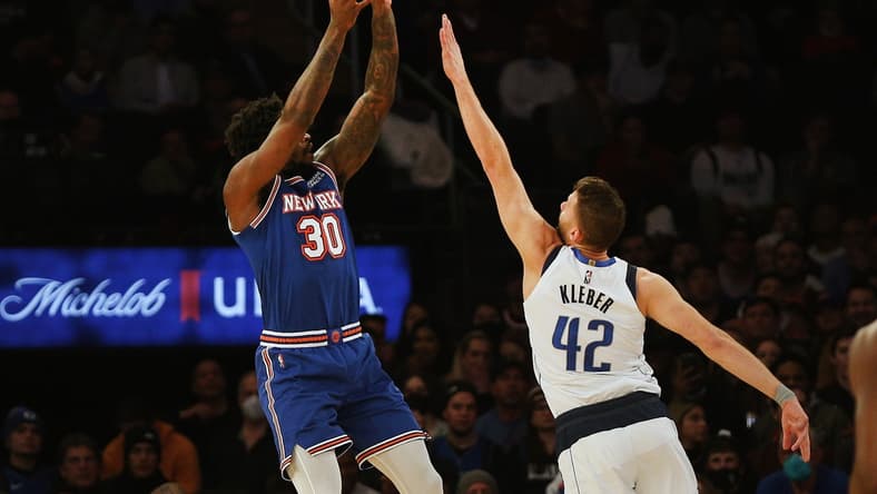Jan 12, 2022; New York, New York, USA; New York Knicks forward Julius Randle (30) takes a shot while being defended by Dallas Mavericks forward Maxi Kleber (42) during the first half at Madison Square Garden. Mandatory Credit: Andy Marlin-USA TODAY Sports