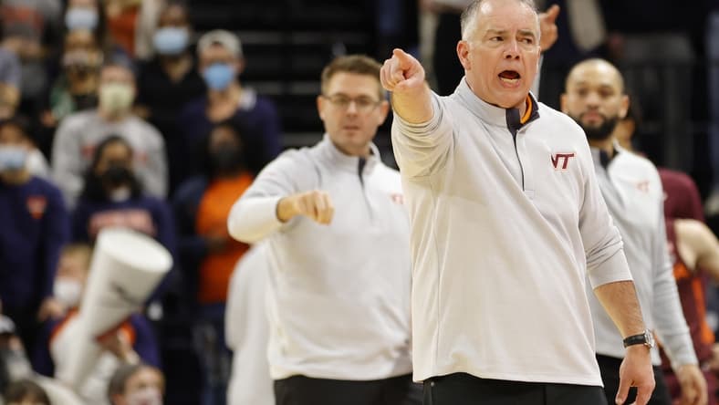 Jan 12, 2022; Charlottesville, Virginia, USA; Virginia Tech Hokies head coach Mike Young reacts from the bench against the Virginia Cavaliers during the second half at John Paul Jones Arena. Mandatory Credit: Geoff Burke-USA TODAY Sports