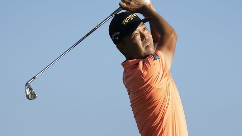 January 13, 2022; Honolulu, Hawaii, USA; Kevin Na hits his tee shot on the 17th hole during the first round of the Sony Open in Hawaii golf tournament at Waialae Country Club. Mandatory Credit: Kyle Terada-USA TODAY Sports