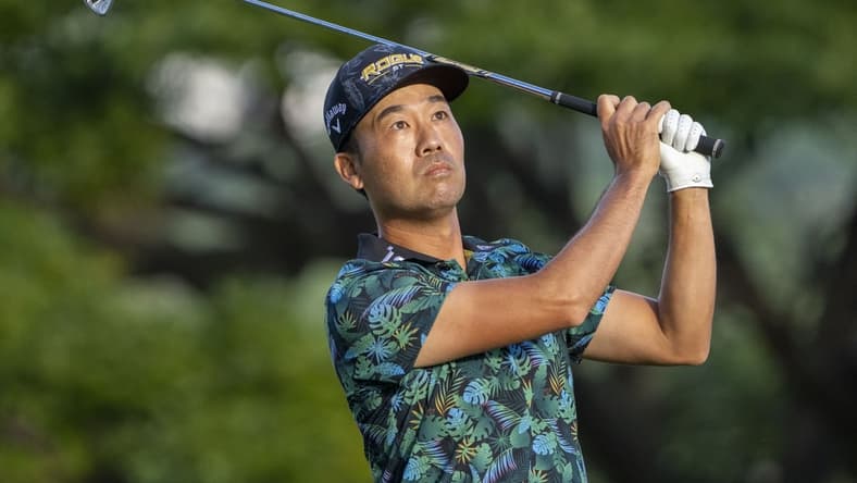 January 14, 2022; Honolulu, Hawaii, USA; Kevin Na hits his tee shot on the 11th hole during the second round of the Sony Open in Hawaii golf tournament at Waialae Country Club. Mandatory Credit: Kyle Terada-USA TODAY Sports