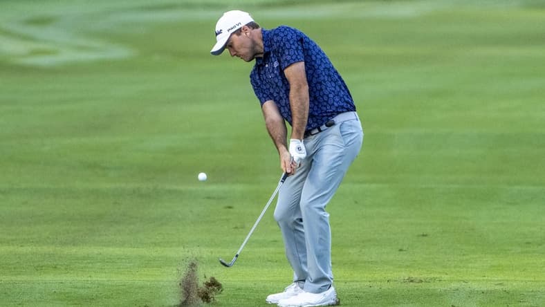 January 14, 2022; Honolulu, Hawaii, USA; Russell Henley hits his chip shot on the 10th hole during the second round of the Sony Open in Hawaii golf tournament at Waialae Country Club. Mandatory Credit: Kyle Terada-USA TODAY Sports