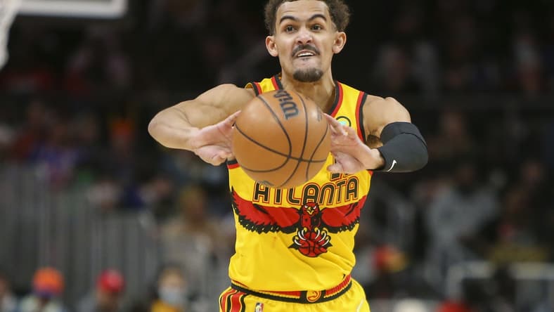 Jan 15, 2022; Atlanta, Georgia, USA; Atlanta Hawks guard Trae Young (11) passes the ball against the New York Knicks in the second half at State Farm Arena. Mandatory Credit: Brett Davis-USA TODAY Sports