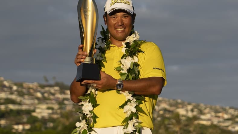 January 16, 2022; Honolulu, Hawaii, USA; Hideki Matsuyama poses with the trophy during the final round of the Sony Open in Hawaii golf tournament at Waialae Country Club. Mandatory Credit: Kyle Terada-USA TODAY Sports