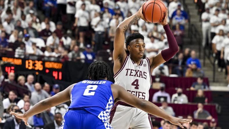 Jan 19, 2022; College Station, Texas, USA; Texas A&M Aggies guard Wade Taylor IV (4) throws the ball during the second half against the Kentucky Wildcats at Reed Arena. Mandatory Credit: Maria Lysaker-USA TODAY Sports