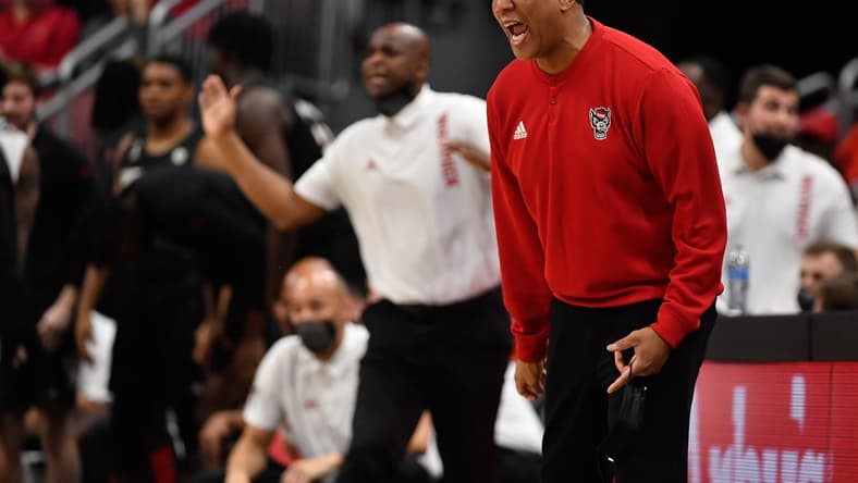 Jan 12, 2022; Louisville, Kentucky, USA; North Carolina State Wolfpack head coach Kevin Keatts reacts during the second half against the Louisville Cardinals at KFC Yum! Center. N.C. State defeated Louisville 79-63. Mandatory Credit: Jamie Rhodes-USA TODAY Sports