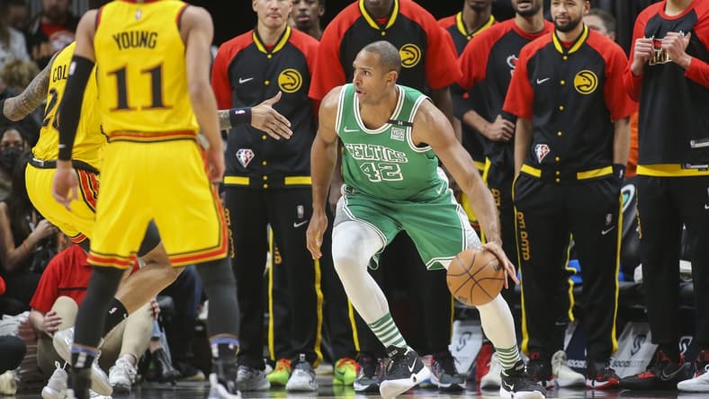 Jan 28, 2022; Atlanta, Georgia, USA; Boston Celtics center Al Horford (42) drives to the basket against the Atlanta Hawks in the first quarter at State Farm Arena. Mandatory Credit: Brett Davis-USA TODAY Sports