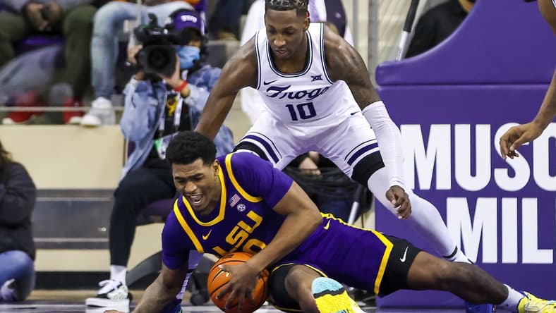 Jan 29, 2022; Fort Worth, Texas, USA; LSU Tigers guard Brandon Murray (0) grabs a loose ball in front of TCU Horned Frogs guard Damion Baugh (10) during the first half at Ed and Rae Schollmaier Arena. Mandatory Credit: Kevin Jairaj-USA TODAY Sports