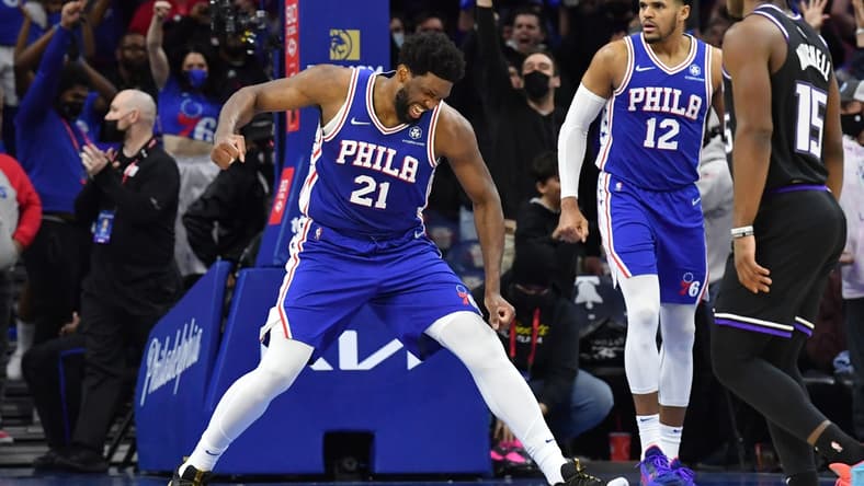 Jan 29, 2022; Philadelphia, Pennsylvania, USA; Philadelphia 76ers center Joel Embiid (21) celebrates after defeating against the Sacramento Kings at Wells Fargo Center. Mandatory Credit: Eric Hartline-USA TODAY Sports
