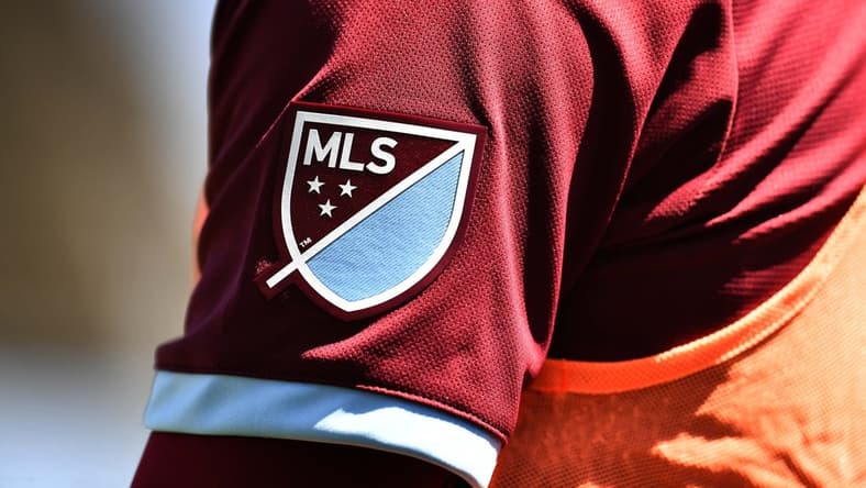 Apr 14, 2018; Commerce City, CO, USA; Detailed view of Colorado Rapids midfielder Dillon Serna (17) MLS emblem logo in the first half of the match against the Toronto FC at Dick's Sporting Goods Park. Mandatory Credit: Ron Chenoy-USA TODAY Sports