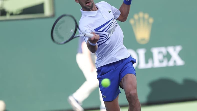 Novak Djokovic and Fabio Fognini play doubles against Lukasz Kubot and Marcelo Melo during the doubles semifinal match at the BNP Paribas Open in Indian Wells, March 15, 2019. 

Bnp Paribas Open March 15 7