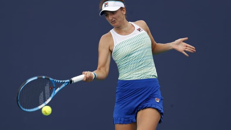 Mar 21, 2019; Miami Gardens, FL, USA; Irina-Camelia Begu of Romania hits a forehand against Bianca Andreescu of Canada (not pictured) in the first round of the Miami Open at Miami Open Tennis Complex. Mandatory Credit: Geoff Burke-USA TODAY Sports