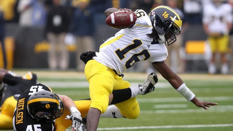 Tyler Nielsen trips up Michigan quarterback Denard Robinson in a game played Nov. 5, 2011 in Iowa City.

Iowbrd 11 06 2011 Pc 1 B005 2011 11 05 Img Iow 1106 Ia Vs Mich 1 1 Aoieg4p Img Iow 1106 Ia Vs Mich 1 1 Aoieg4p