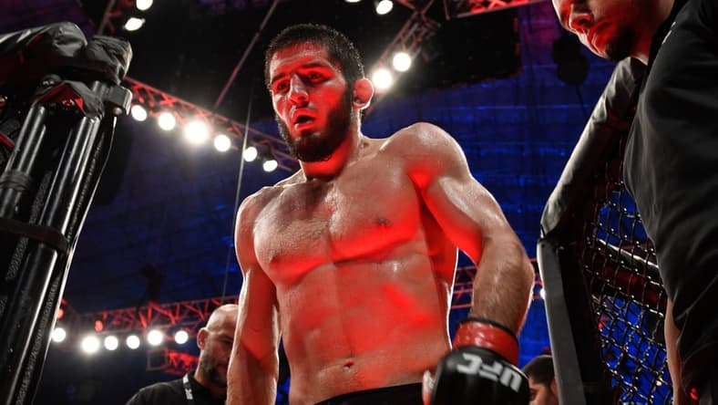 Sep 7, 2019; Abu Dhabi, UAE; Islam Makhachev (red gloves) against Davi Ramos (not pictured) during UFC 242 at The Arena. Mandatory Credit: Per Haljestam-USA TODAY Sports