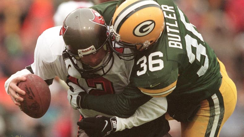 Green Bay Packers safety LeRoy Butler sacks Tampa Bay quarterback Trent Dilfer during the second quarter of their game Sunday, Jan. 4, 1998 at Lambeau Field in Green Bay.

Leroy Butler Sacks Trent Dilfer