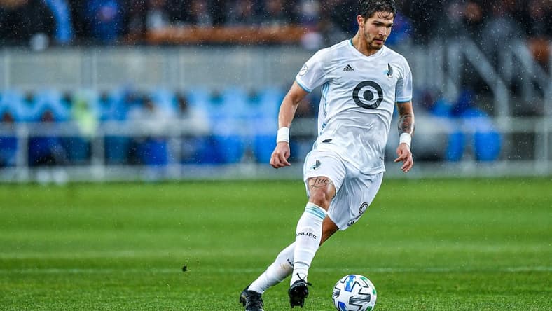 Mar 7, 2020; San Jose, California, USA; Minnesota United forward Luis Amarilla (9) moves the ball in front of the net at Avaya Stadium. Mandatory Credit: Chris Brown-USA TODAY Sports