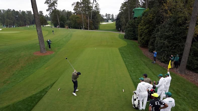 Nov 14, 2020; Augusta, Georgia, USA; Paul Casey plays his shot from the 18th tee during continuation of the second round of The Masters golf tournament at Augusta National GC. Mandatory Credit: Rob Schumacher-USA TODAY Sports