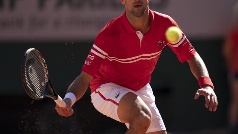 Jun 13, 2021; Paris, France; Novak Djokovic (SRB) in action during the men's final against Stefanos Tsitsipas (GRE) on day 15 of the French Open at Stade Roland Garros. Mandatory Credit: Susan Mullane-USA TODAY Sports
