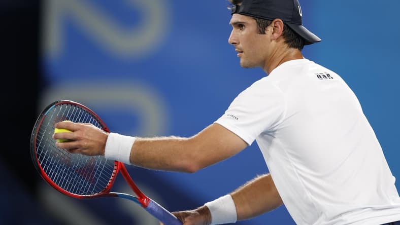Jul 27, 2021; Tokyo, Japan;  Marcos Giron (USA) in his match against Kei Nishikori (JPN) during the Tokyo 2020 Olympic Summer Games at Ariake Tennis Park. Mandatory Credit: Yukihito Taguchi-USA TODAY Sports