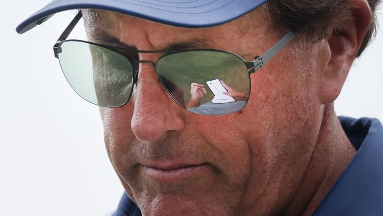 Phil Mickelson takes notes in his pad after playing Hole No. 16 during the second round of the World Golf Championships FedEx-St. Jude Invitational at TPC Southwind  in Memphis, Tenn. on Friday, August 6, 2021.

Jrca6762