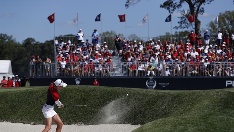 Sep 6, 2021; Toledo, Ohio, USA; Nelly Korda of Team USA hits a bunker shot on the twelfth hole during singles matches in the 2021 Solheim Cup at Invernes Club. Mandatory Credit: Raj Mehta-USA TODAY Sports