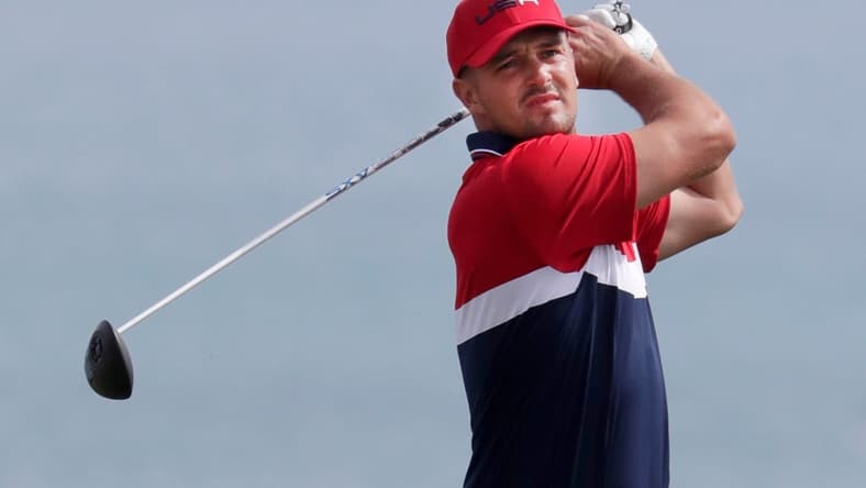 Bryson DeChambeau watches his shot off the 9th tee during the Ryder Cup at Whistling Straits, Sunday, September 26, 2021, in Haven, Wis.Gary C. Klein/USA TODAY NETWORK-Wisconsin

She 092621 Ryder Cup Day 3 Gck 009
