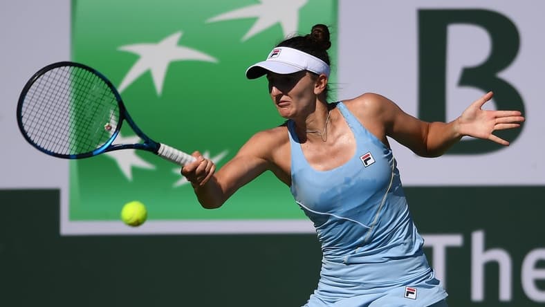 Oct 10, 2021; Indian Wells, CA, USA; Irina-Camelia Begu (ROU) hits a shot against Shelby Rogers (USA) at Indian Wells Tennis Garden. Mandatory Credit: Orlando Ramirez-USA TODAY Sports