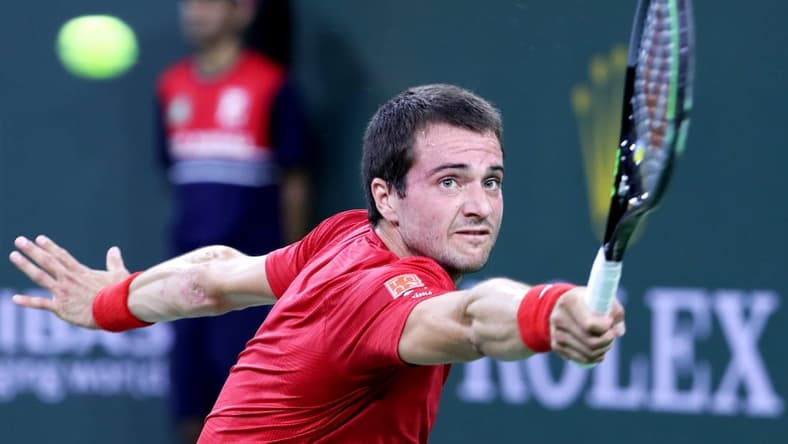 Pedro Martinez of Spain returns a shot to Stefanos Tsitsipas of Greece during the BNP Paribas Open in Indian Wells, Calif., on October 10, 2021.

Stefanos Tsitsipas Vs Pedro Martinez Bnp Paribas2062