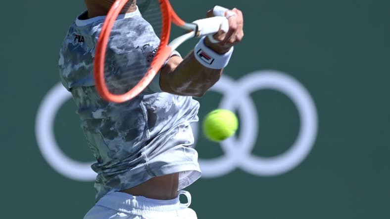 Oct 14, 2021; Indian Wells, CA, USA;  Diego Schwartzman (ARG) hits a shot against Cameron Norrie (GBR) in their quarterfinal match during the BNP Paribas Open at the Indian Wells Tennis Garden. Mandatory Credit: Jayne Kamin-Oncea-USA TODAY Sports