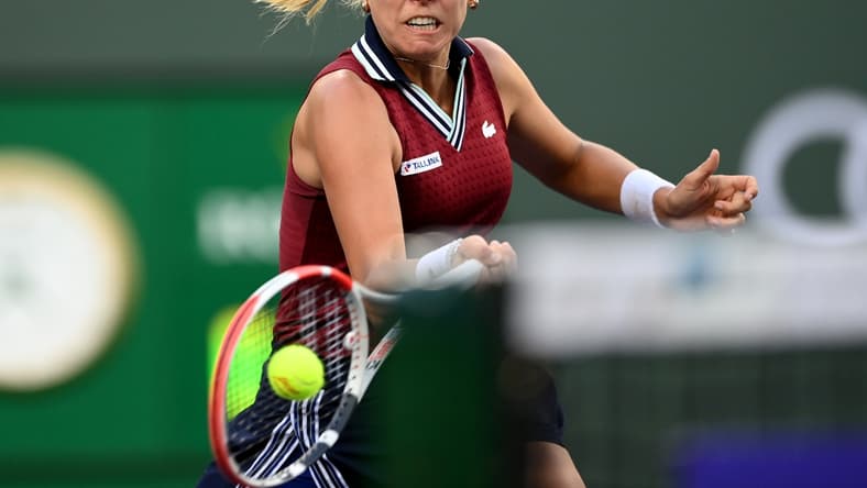 Oct 14, 2021; Indian Wells, CA, USA; Anett Kontaveit (EST) hits a shot against Ons Jabeur (TUN) in their quarterfinal match during the BNP Paribas Open at the Indian Wells Tennis Garden. Mandatory Credit: Jayne Kamin-Oncea-USA TODAY Sports
