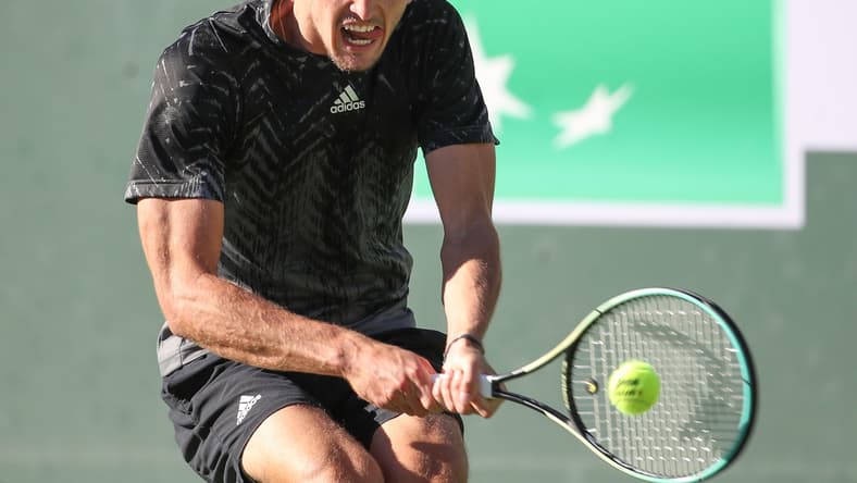 Alexander Zverev hits a shot against Taylor Fritz during their quarterfinal match at the BNP Paribas Open in Indian Wells, October 15, 2021.

Bnp Friday 19