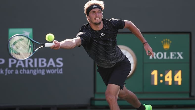 Alexander Zverev reaches for a shot against Taylor Fritz during their quarterfinal match at the BNP Paribas Open in Indian Wells, October 15, 2021.

Bnp Friday 15