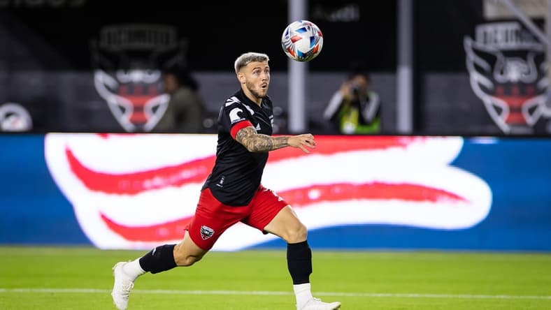 Oct 30, 2021; Washington, District of Columbia, USA; D.C. United forward Paul Arriola (7) chases the ball against the Columbus Crew during the first half of the MLS game at Audi Field. Mandatory Credit: Scott Taetsch-USA TODAY Sports