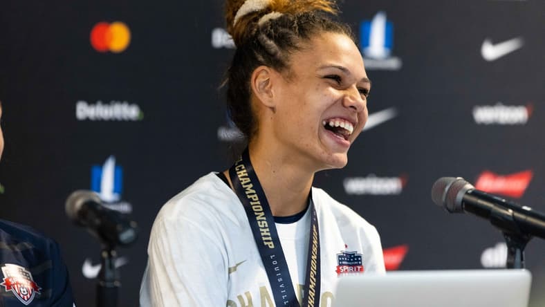 Nov 20, 2021; Louisville, Kentucky, USA; Washington Spirit forward Trinity Rodman (2) talks to the media following Washington Spirit's win in the NWSL Championship match against the Chicago Red Stars at Lynn Family Stadium. Mandatory Credit: Jordan Prather-USA TODAY Sports