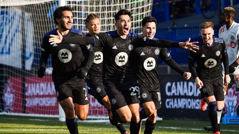 Nov 21, 2021; Montreal, Quebec, Canada; CF Montreal midfielder Mathieu Choiniere (29) runs towards the crowd after a goal during the second half at Stade Saputo. Mandatory Credit: David Kirouac-USA TODAY Sports