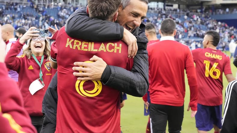Nov 28, 2021; Kansas City, MO, USA; Real Salt Lake midfielder Damir Kreilach (8) and manager Pablo Mastroeni (center, right) celebrate after defeating the Sporting Kansas City in the conference semifinals of the 2021 MLS playoffs at Children's Mercy Park. Mandatory Credit: Jay Biggerstaff-USA TODAY Sports