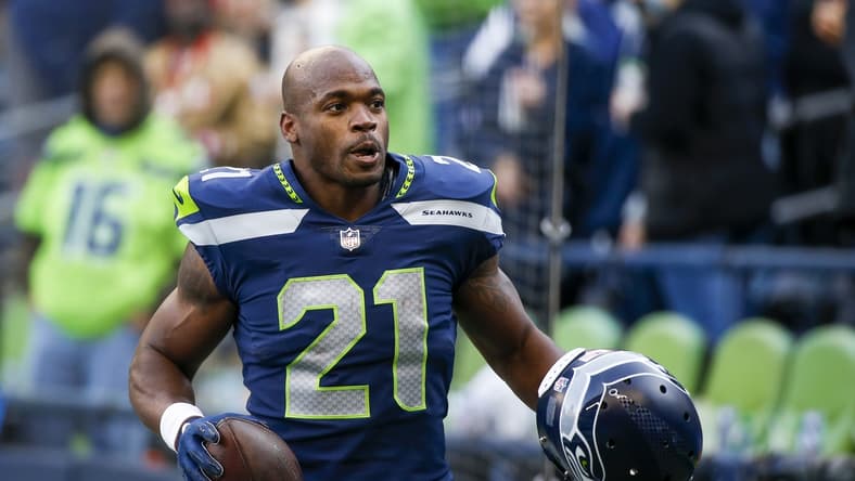 Dec 5, 2021; Seattle, Washington, USA; Seattle Seahawks running back Adrian Peterson (21) returns to the locker room following pregame warmups against the San Francisco 49ers at Lumen Field. Mandatory Credit: Joe Nicholson-USA TODAY Sports